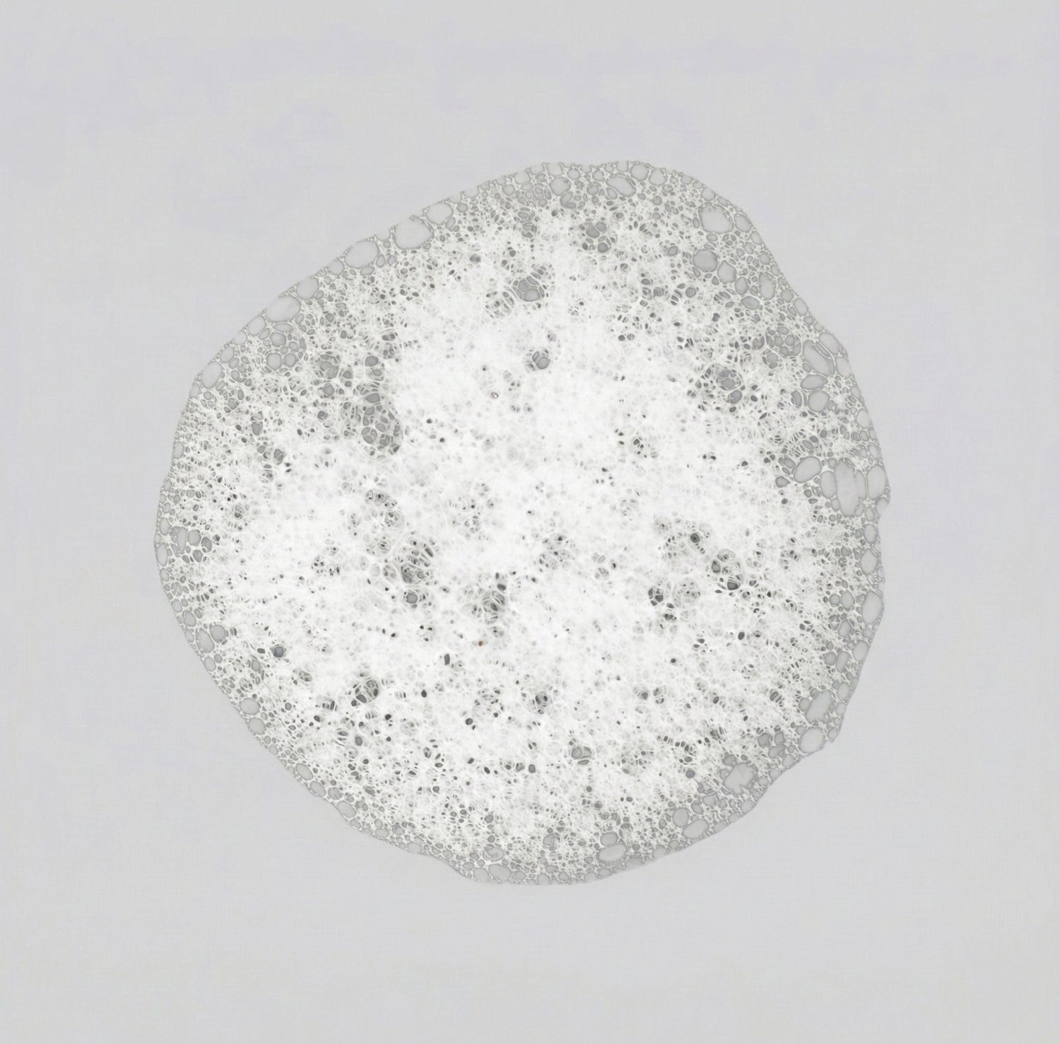 soap suds on a grey background