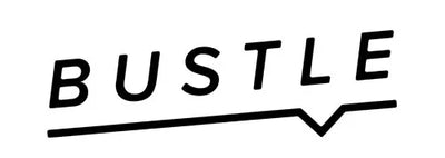 Logo of 'Bustle' magazine with red and black text.