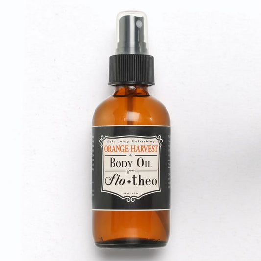 Brown bottle of Orange Harvest Body Oil from Flotheo on a white background