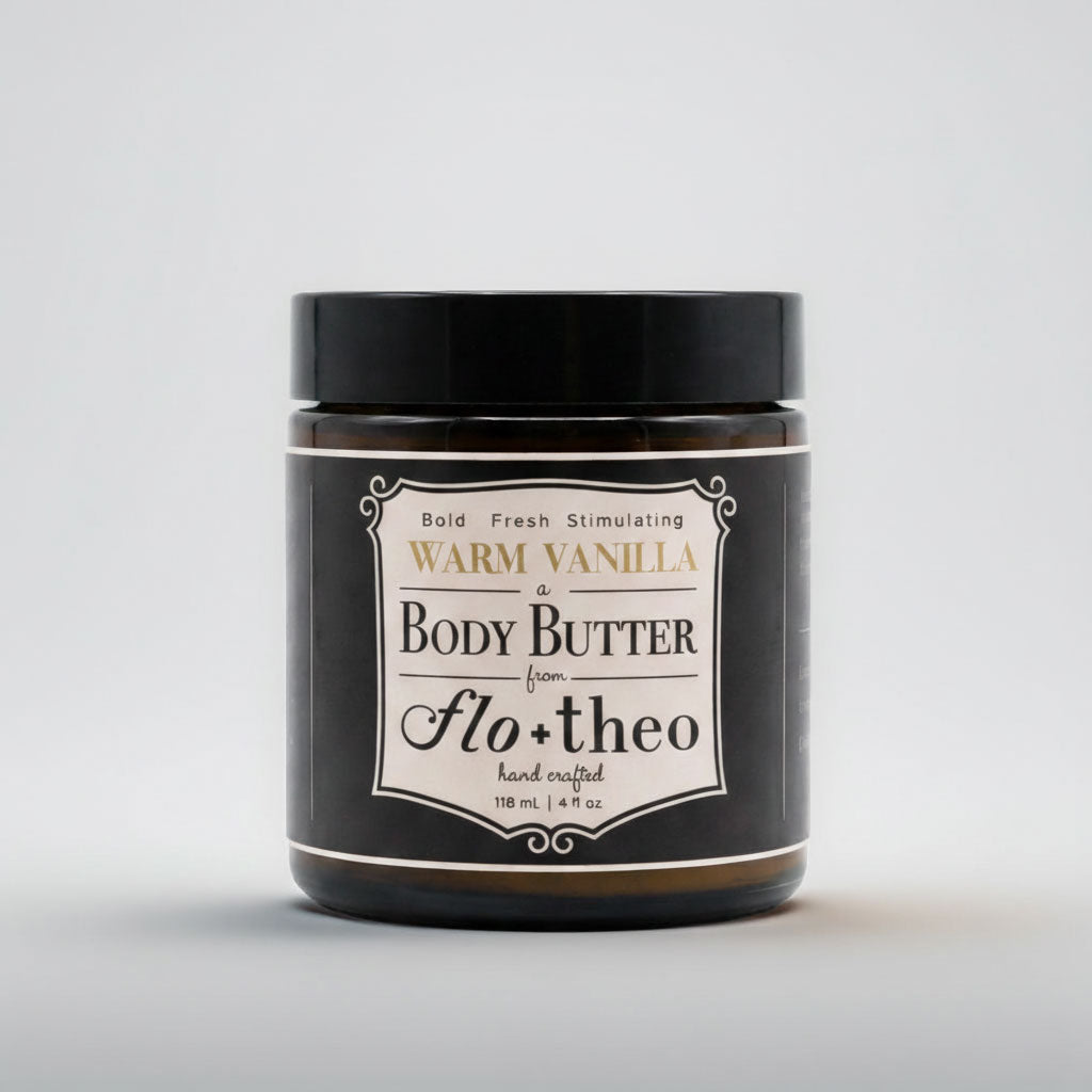 Jar of warm vanilla body butter from flo+theo on a light gray background