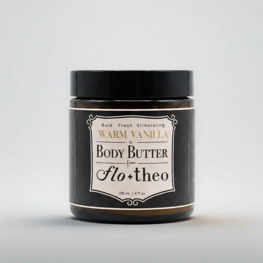 Jar of warm vanilla body butter from Flo+theo on a light gray background