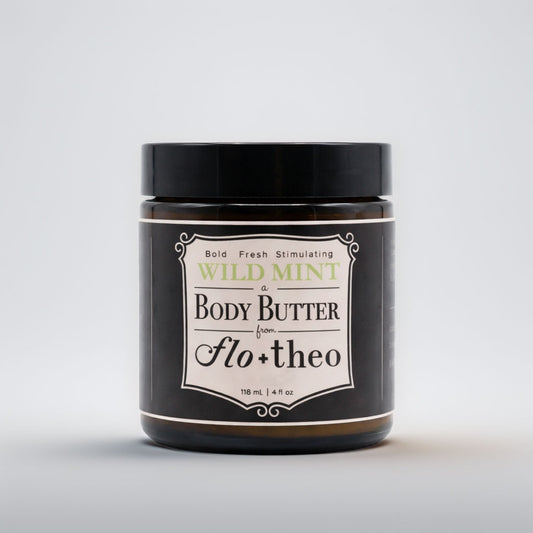 Jar of wild mint body butter from Flo+theo on a light gray background
